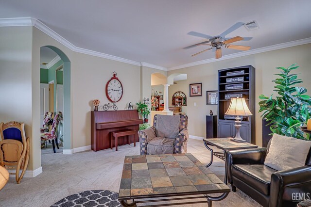 502 Lewisham St, Bakersfield, CA 93311 - living area with arched walkways, ceiling fan, ornamental molding, carpet, and ornate columns