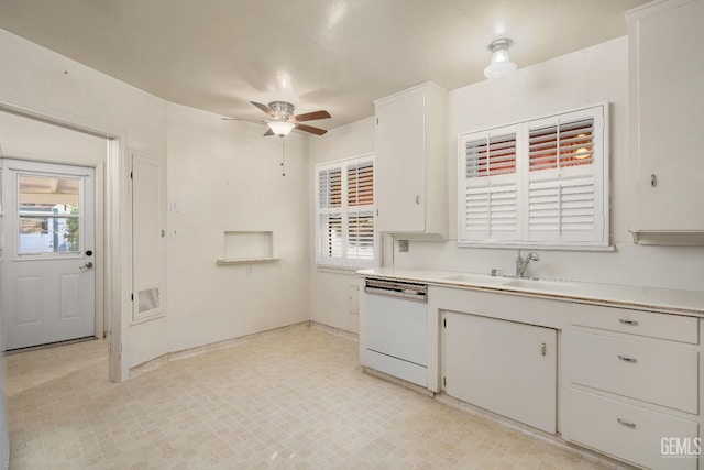 kitchen featuring white cabinetry, dishwasher, ceiling fan, and sink