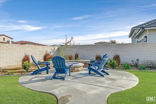 view of patio featuring a grill and ceiling fan