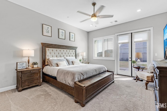 carpeted bedroom with access to exterior, french doors, and ceiling fan