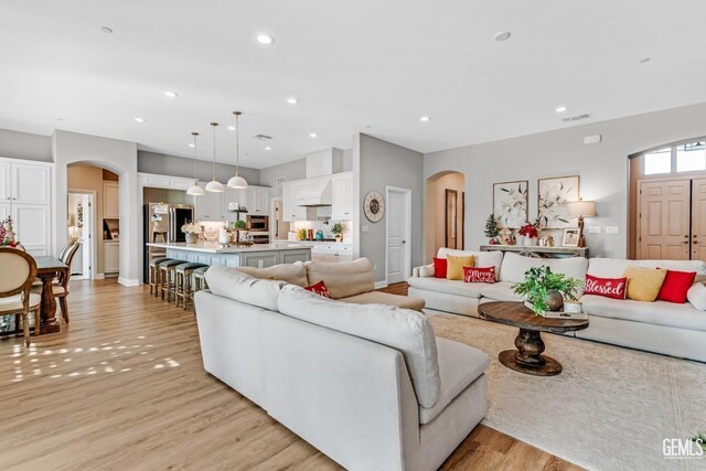 living room with light hardwood / wood-style floors