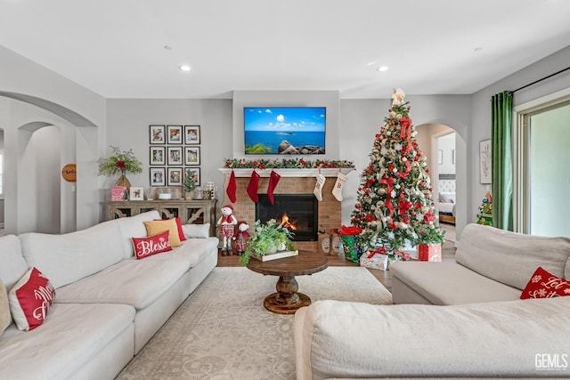 living room featuring hardwood / wood-style floors and a fireplace