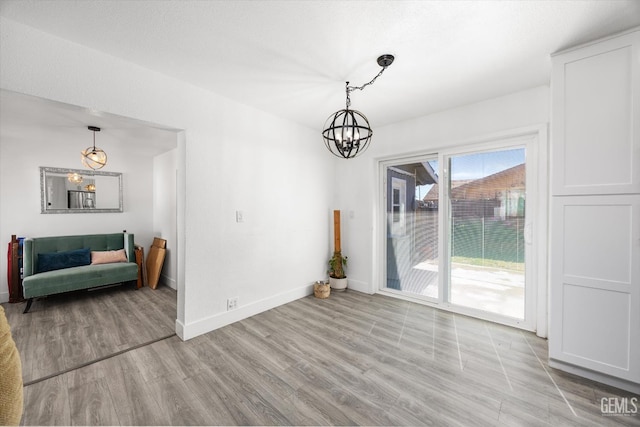 21633 Golden Hills Blvd, Tehachapi, CA 93561 - unfurnished dining area featuring a chandelier and light wood finished floors