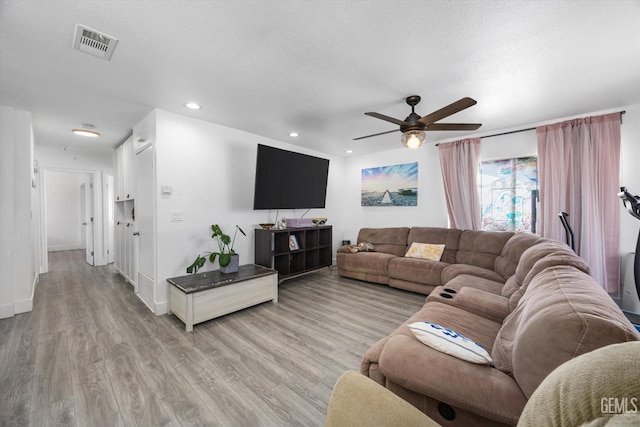 21633 Golden Hills Blvd, Tehachapi, CA 93561 - living room featuring a ceiling fan, light wood-style flooring, and recessed lighting