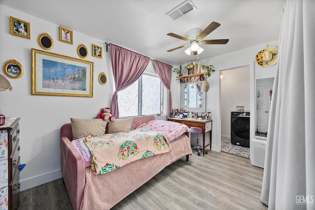 21633 Golden Hills Blvd, Tehachapi, CA 93561 - bedroom with washer / clothes dryer, wood finished floors, and ceiling fan