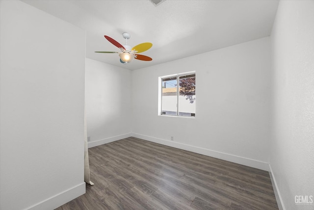 21633 Golden Hills Blvd, Tehachapi, CA 93561 - unfurnished room with a ceiling fan and dark wood-style flooring