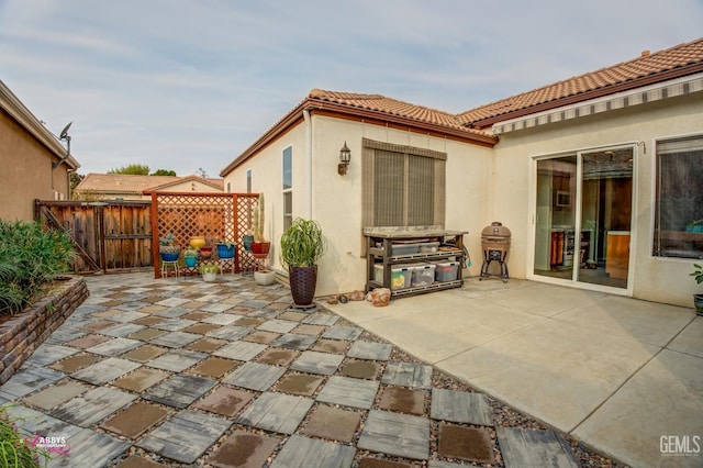 view of patio with a grill