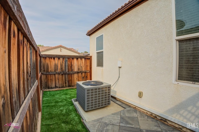 view of yard featuring central AC