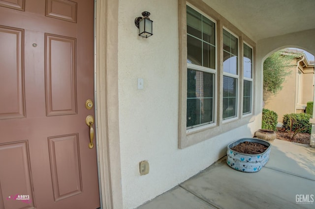 entrance to property with a porch