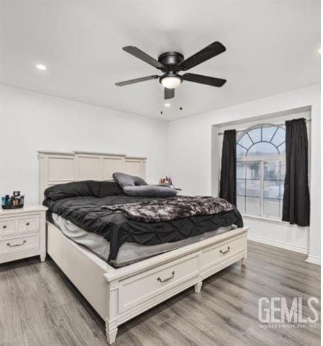 337 Cesar Chavez Ln, Delano, CA 93215 - bedroom with wood finished floors, recessed lighting, and ceiling fan