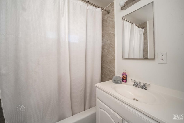 full bath with shower / bath combo with shower curtain and vanity