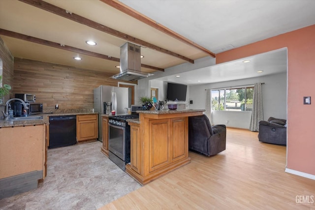 kitchen with stainless steel appliances, open floor plan, a sink, and island range hood