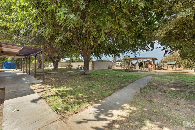 view of yard with fence