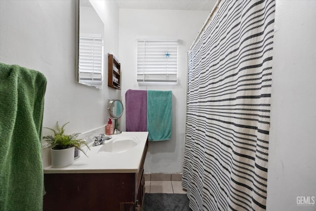 bathroom with vanity and tile patterned floors