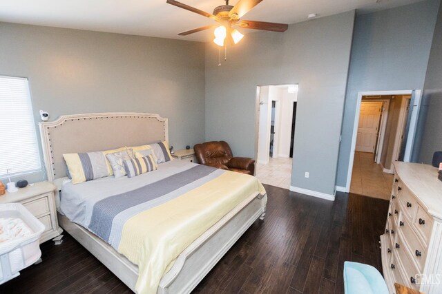 bedroom featuring dark hardwood / wood-style floors and ceiling fan