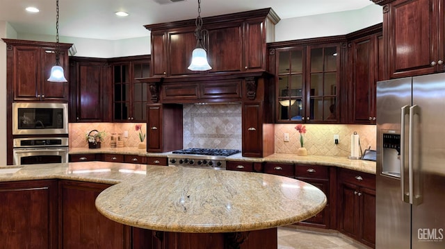 3006 Springbank Ct, Bakersfield, CA 93311 - kitchen featuring stainless steel appliances, glass insert cabinets, decorative backsplash, light stone countertops, and recessed lighting