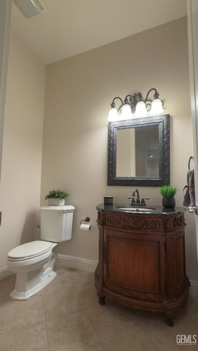 3006 Springbank Ct, Bakersfield, CA 93311 - half bath featuring baseboards, toilet, tile patterned flooring, and vanity
