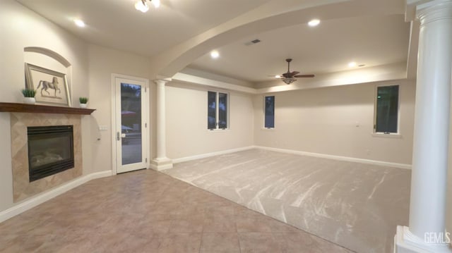 3006 Springbank Ct, Bakersfield, CA 93311 - unfurnished living room with decorative columns, ceiling fan, a fireplace, recessed lighting, and a raised ceiling