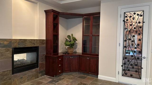 3006 Springbank Ct, Bakersfield, CA 93311 - detailed view of baseboards and a tile fireplace