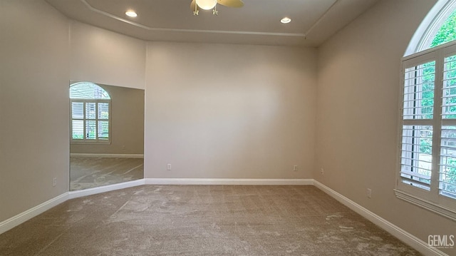 3006 Springbank Ct, Bakersfield, CA 93311 - carpeted spare room featuring plenty of natural light, baseboards, a ceiling fan, recessed lighting, and a tray ceiling