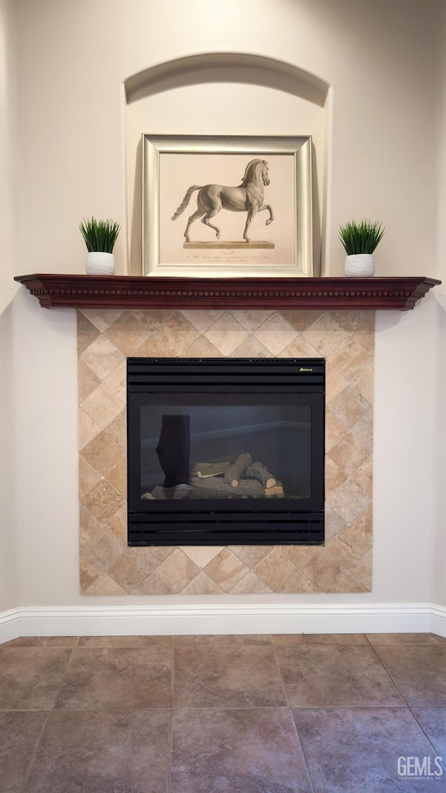 3006 Springbank Ct, Bakersfield, CA 93311 - detailed view of baseboards and a tile fireplace