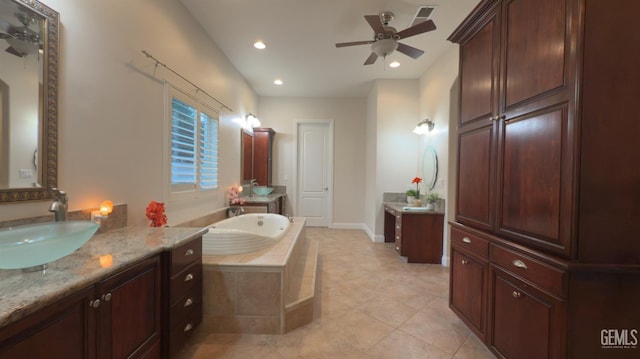 3006 Springbank Ct, Bakersfield, CA 93311 - bathroom with two vanities, a garden tub, ceiling fan, tile patterned floors, and recessed lighting