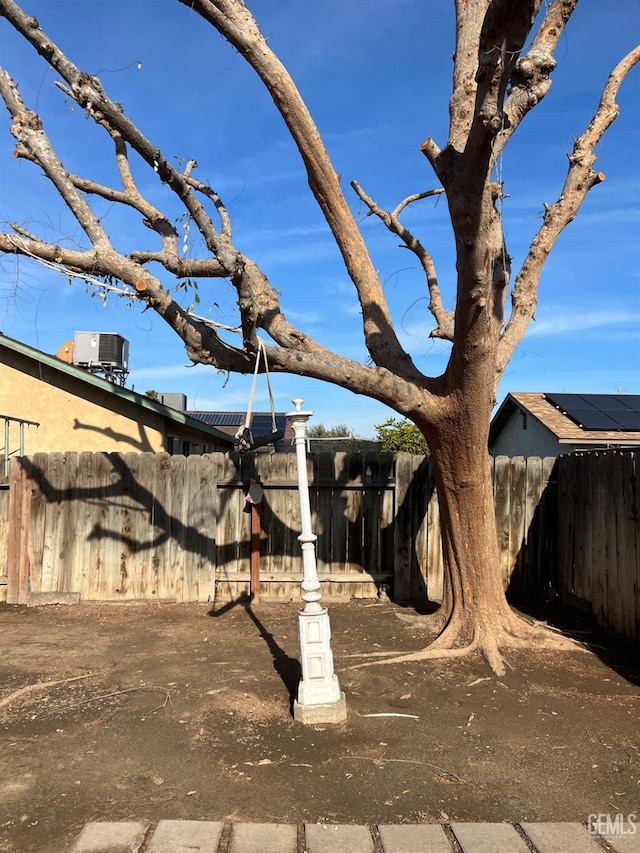 view of yard with central AC