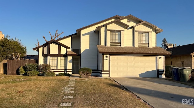 view of front facade featuring a garage and a front yard