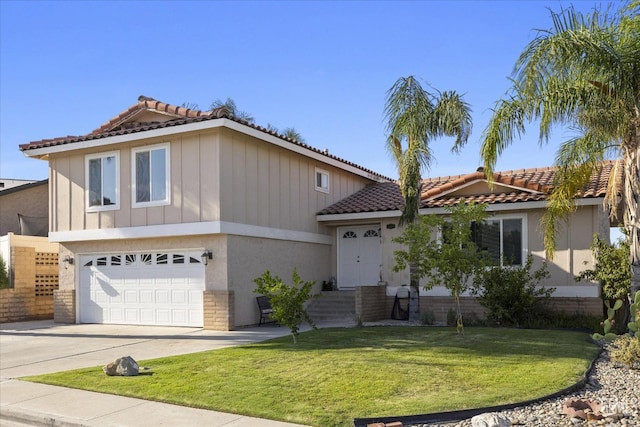 view of front facade featuring a garage and a front yard