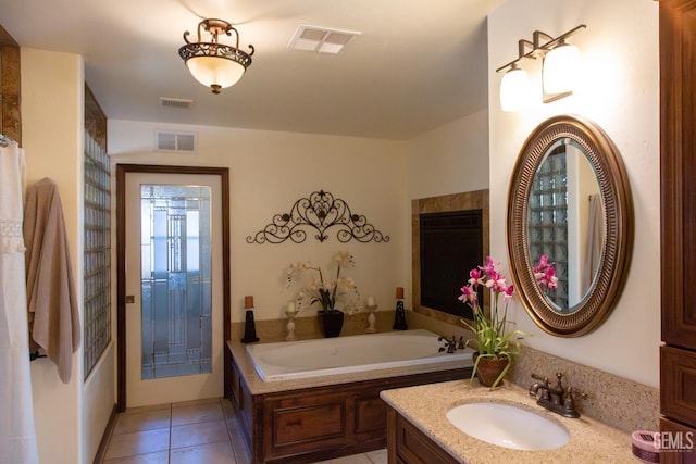 29201 Angus Ct, Tehachapi, CA 93561 - bathroom with vanity, a bath, and tile patterned floors