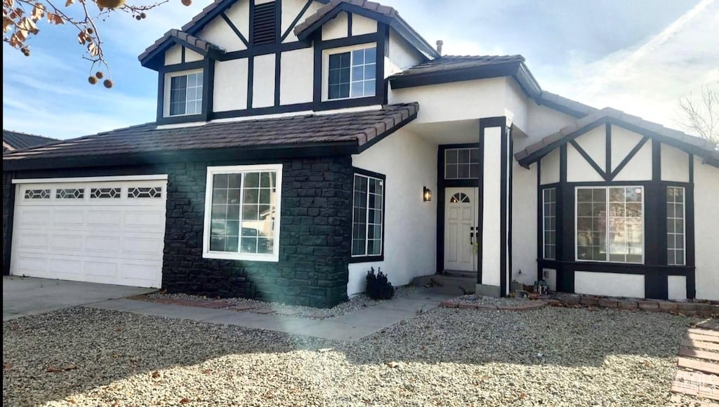 tudor house with a garage