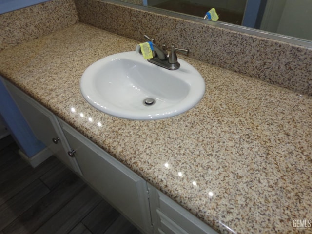 3001 Peach Tree Ct, Bakersfield, CA 93301 - room details with tasteful backsplash and vanity