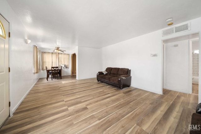 unfurnished room featuring hardwood / wood-style flooring and ceiling fan