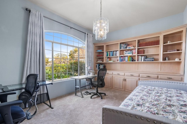 carpeted bedroom featuring multiple windows and a notable chandelier