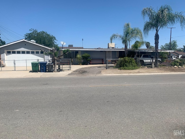 1473 22nd Ave, Delano, CA 93215 - view of front of property with a gate and fence