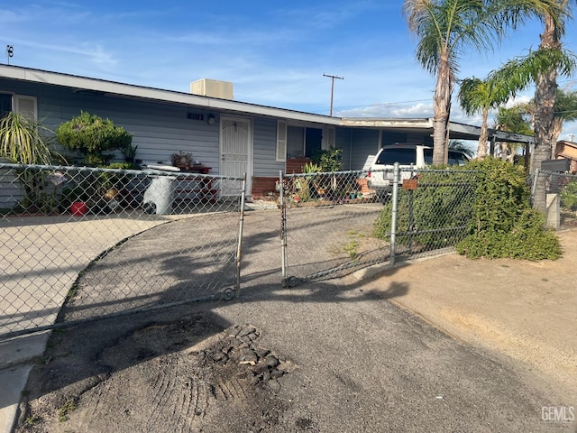 1473 22nd Ave, Delano, CA 93215 - view of front of property featuring a gate and a fenced front yard