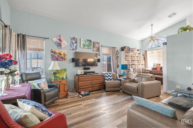 3809 Wensley Ct, Bakersfield, CA 93311 - living area with wood finished floors, plenty of natural light, a ceiling fan, and lofted ceiling