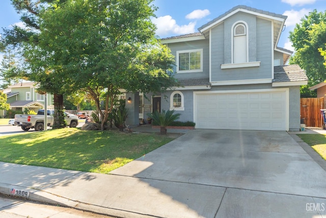 3809 Wensley Ct, Bakersfield, CA 93311 - traditional home featuring an attached garage, driveway, stucco siding, and a tiled roof