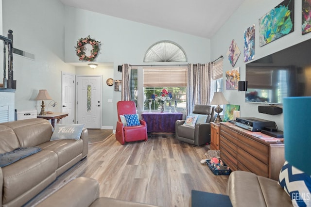 3809 Wensley Ct, Bakersfield, CA 93311 - living room with wood finished floors and high vaulted ceiling