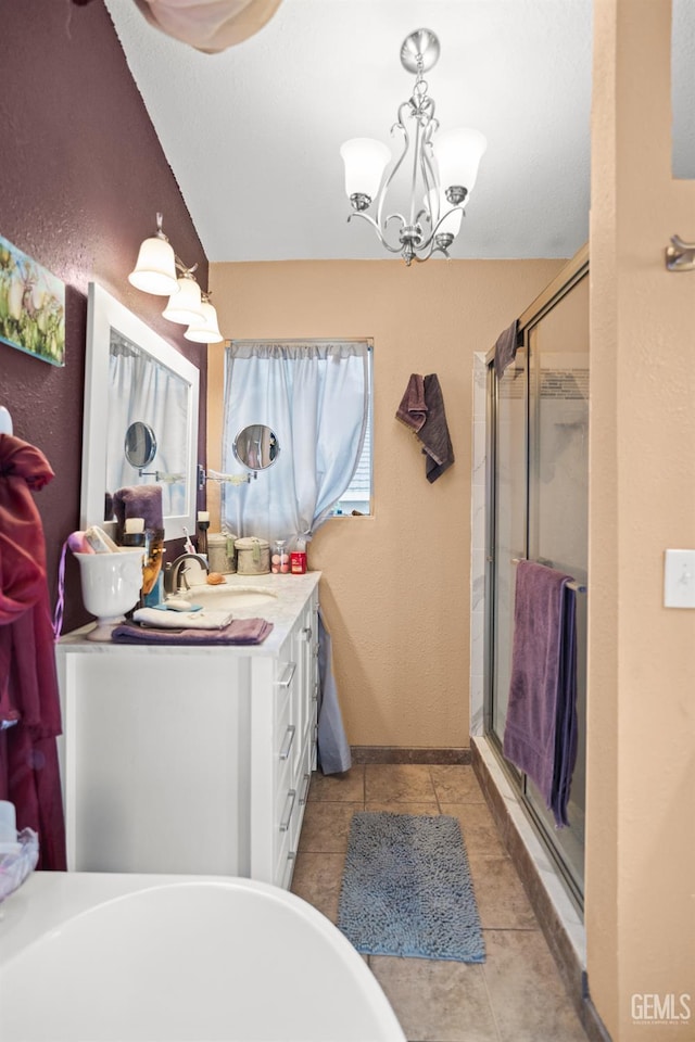 3809 Wensley Ct, Bakersfield, CA 93311 - bathroom featuring a shower stall, vanity, tile patterned flooring, a chandelier, and baseboards