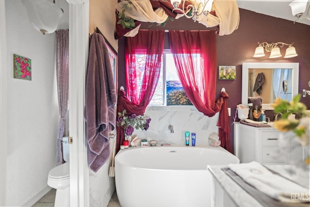3809 Wensley Ct, Bakersfield, CA 93311 - bathroom featuring a freestanding tub and toilet