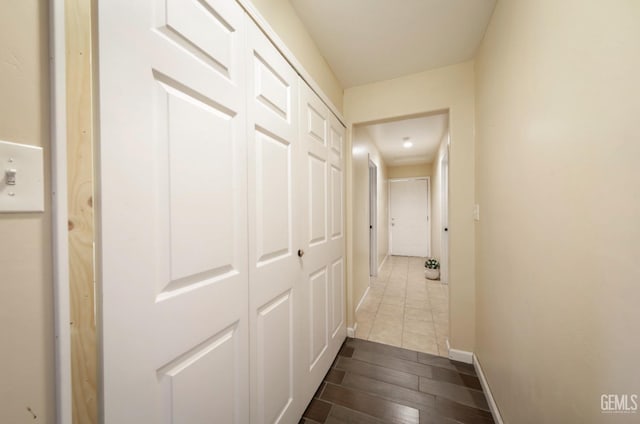 corridor featuring hardwood / wood-style floors