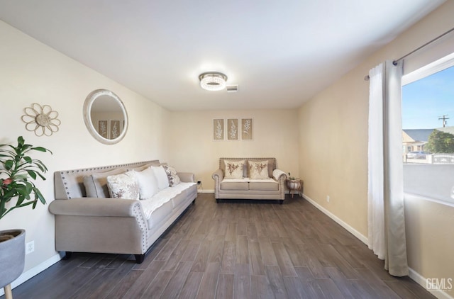 living room featuring dark hardwood / wood-style flooring