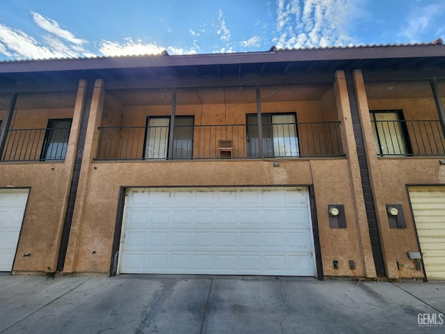 view of property featuring a garage