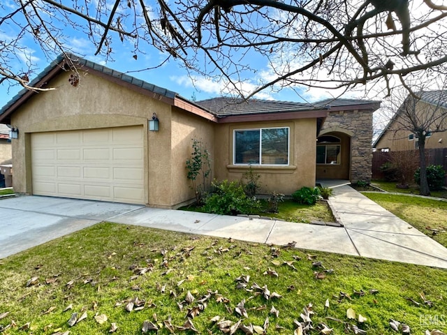 ranch-style home featuring a garage and a front lawn