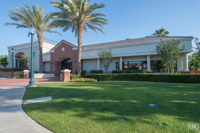 13620 Stonethwaite Ln, Bakersfield, CA 93311 - view of front facade with a front yard and stucco siding
