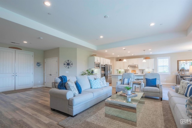 13620 Stonethwaite Ln, Bakersfield, CA 93311 - living room featuring recessed lighting and wood finished floors