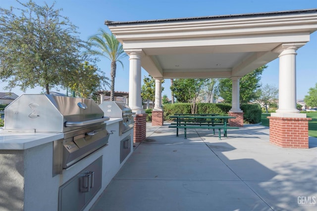13620 Stonethwaite Ln, Bakersfield, CA 93311 - view of patio / terrace featuring exterior kitchen