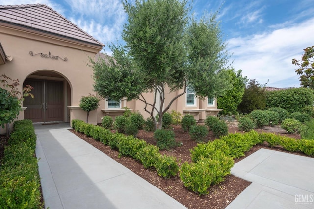 13620 Stonethwaite Ln, Bakersfield, CA 93311 - doorway to property featuring stucco siding