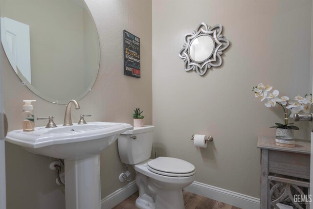 13620 Stonethwaite Ln, Bakersfield, CA 93311 - bathroom featuring wood finished floors and toilet